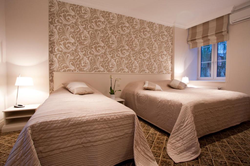 Real House Aparthotel Вилнюс Стая снимка