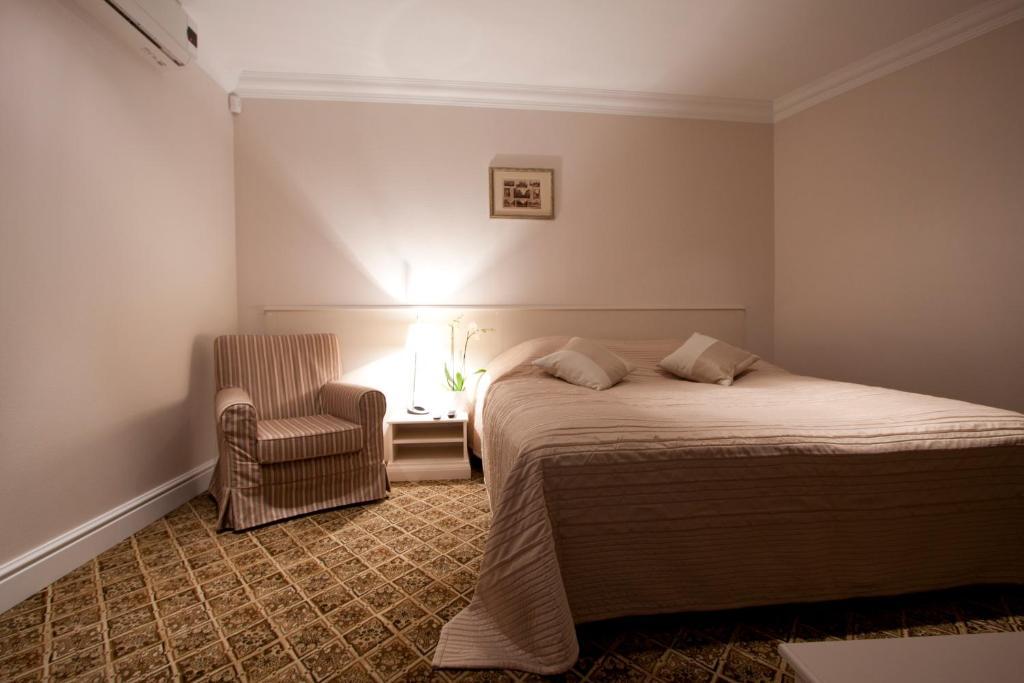 Real House Aparthotel Вилнюс Стая снимка