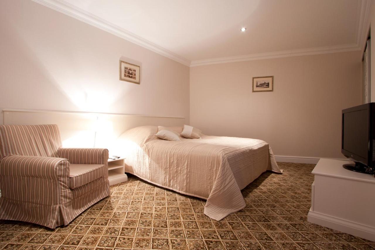 Real House Aparthotel Вилнюс Стая снимка